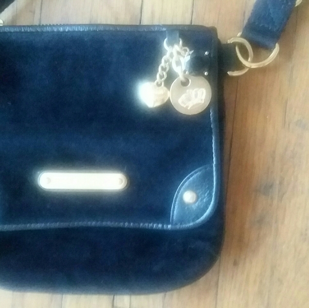 Juicy Couture Black satchel!!!!!!! Poka-Dot Interior soft material
ITEM #1 - Picture 10 of 16